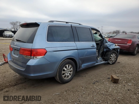 2010 Honda Odyssey EX-L z VIN 5FNRL3H7XAB059318, wystawiony jako Copart lot #85285514 z przebiegiem Nie podano mil oraz Szkoda całkowita • Salvage title. Historia ofert i sprzedaży dostępna na DreamBid. Obrazek 3.