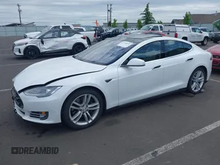2016 Tesla Model S 90D with VIN 5YJSA1E21GF121962, listed as a IAAI auction lot 42130291 with 114,670 mi miles and . Bid and sale history available at DreamBid. Image 2.