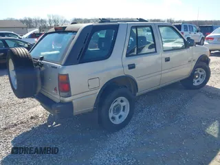 1995 Isuzu Rodeo z VIN 4S2CM58V4S4363500, wystawiony jako IAAI lot #41821801 z przebiegiem 94 480 mil mil oraz . Historia ofert i sprzedaży dostępna na DreamBid. Obrazek 4.