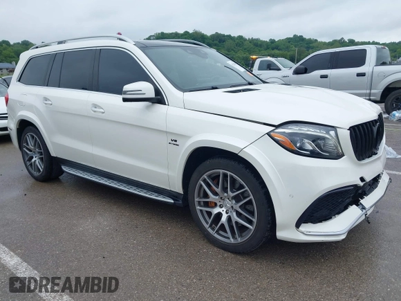 2018 Mercedes-Benz GLS 63 AMG with VIN 4JGDF7FE1JB099084, listed as a IAAI auction lot 42220385 with 97,904 mi miles and . Bid and sale history available at DreamBid. Image 1.