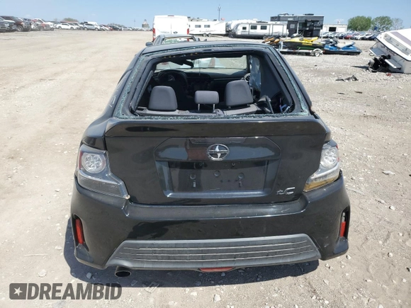 2014 Scion tC z VIN JTKJF5C79E3079580, wystawiony jako Copart lot #78163654 z przebiegiem Nie podano mil oraz Szkody całkowita. Historia ofert i sprzedaży dostępna na DreamBid. Obrazek 6.