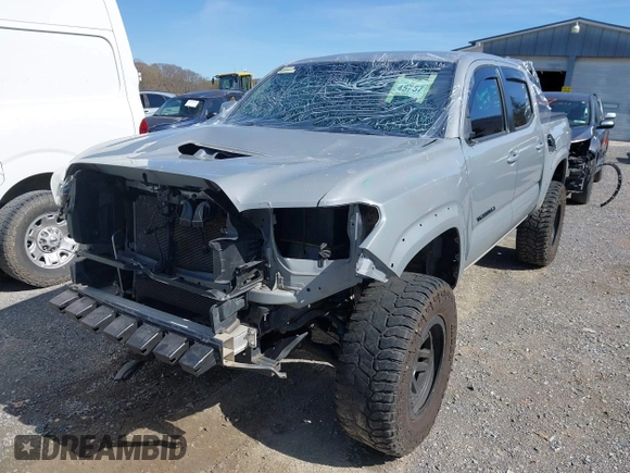 2020 Toyota Tacoma SR5 z VIN 5TFCZ5AN5LX229019, wystawiony jako IAAI lot #41907694 z przebiegiem 79 355 mil mil oraz . Historia ofert i sprzedaży dostępna na DreamBid. Obrazek 6.