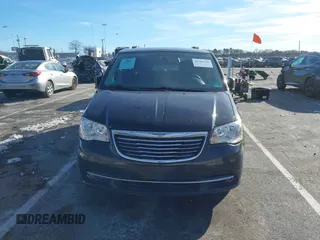 2016 Chrysler Town & Country Touring with VIN 2C4RC1BG7GR231704, listed as a IAAI auction lot 41306140 with 165,890 mi miles. Bid and sale history available at carsss.com. Image 12.