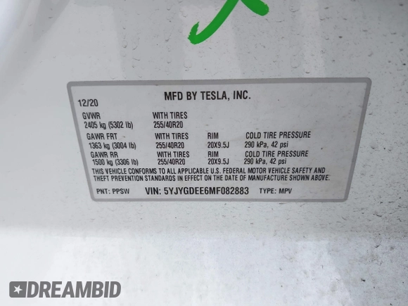 2021 Tesla Model Y Long Range with VIN 5YJYGDEE6MF082883, listed as a IAAI auction lot 42078807 with 64,953 mi miles. Bid and sale history available at carsss.com. Image 9.