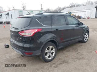 2015 Ford Escape SE with VIN 1FMCU9G90FUC66187, listed as a IAAI auction lot 41678861 with 284,548 mi miles and . Bid and sale history available at DreamBid. Image 4.
