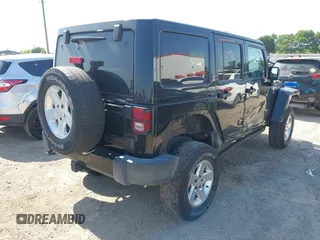 2015 Jeep Wrangler Unlimited Sahara with VIN 1C4BJWEG0FL717536, listed as a IAAI auction lot 42004096 with 90,802 mi miles and . Bid and sale history available at DreamBid. Image 4.