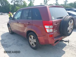 2006 Suzuki Grand Vitara Luxury z VIN JS3TE947164104865, wystawiony jako IAAI lot #42364904 z przebiegiem 189 000 mil mil oraz . Historia ofert i sprzedaży dostępna na DreamBid. Obrazek 3.