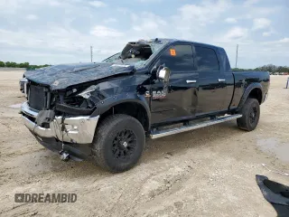 2014 Ram 2500 Laramie with VIN 3C6UR5NL2EG261163, listed as a Copart auction lot 58506475 with 104,554 mi miles and Salvage title. Bid and sale history available at DreamBid. Image 1.