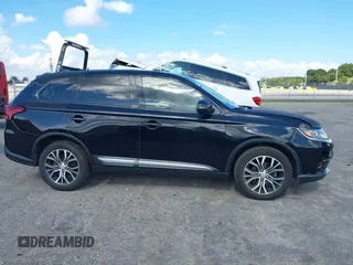 2018 Mitsubishi Outlander SE with VIN JA4AD3A33JZ055813, listed as a IAAI auction lot 41232885 with 126,457 mi miles and . Bid and sale history available at DreamBid. Image 13.