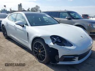 2019 Porsche Panamera with VIN WP0AA2A72KL101325, listed as a IAAI auction lot 41478509 with 32,946 mi miles and . Bid and sale history available at DreamBid. Image 1.