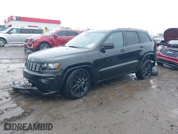 2022 Jeep Grand Cherokee Laredo X with VIN 1C4RJEAG0NC126796, listed as a IAAI auction lot 40755171 with 50,159 mi miles and . Bid and sale history available at DreamBid. Image 18.