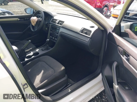 2012 Volkswagen Passat S with VIN 1VWAH7A33CC020242, listed as a IAAI auction lot 42034882 with 188,488 mi miles and . Bid and sale history available at DreamBid. Image 5.