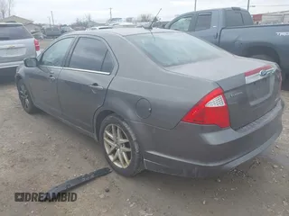 2011 Ford Fusion SEL with VIN 3FAHP0JG2BR232778, listed as a IAAI auction lot 42088562 with 186,584 mi miles. Bid and sale history available at carsss.com. Image 3.