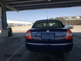 2004 Volkswagen Passat GLX z VIN WVWRH63B94P150234, wystawiony jako Copart lot #54092825 z przebiegiem 89 149 mil mil oraz Czysty tytuł • Clean title. Historia ofert i sprzedaży dostępna na DreamBid. Obrazek 6.