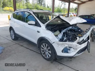 2018 Ford Escape Titanium with VIN 1FMCU9J97JUC10359, listed as a IAAI auction lot 42338123 with 51,503 mi miles and . Bid and sale history available at DreamBid. Image 1.