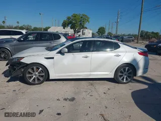 2012 Kia Optima SX with VIN 5XXGR4A6XCG017695, listed as a IAAI auction lot 41837506 with 210,845 mi miles. Bid and sale history available at carsss.com. Image 13.