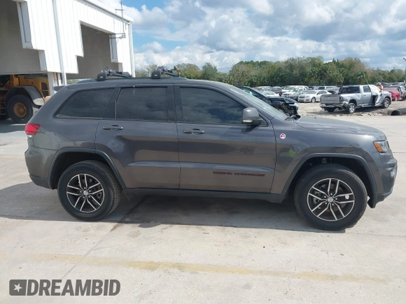 2018 Jeep Grand Cherokee Trailhawk with VIN 1C4RJFLG8JC427345, listed as a IAAI auction lot 41557222 with 49,469 mi miles and . Bid and sale history available at DreamBid. Image 13.