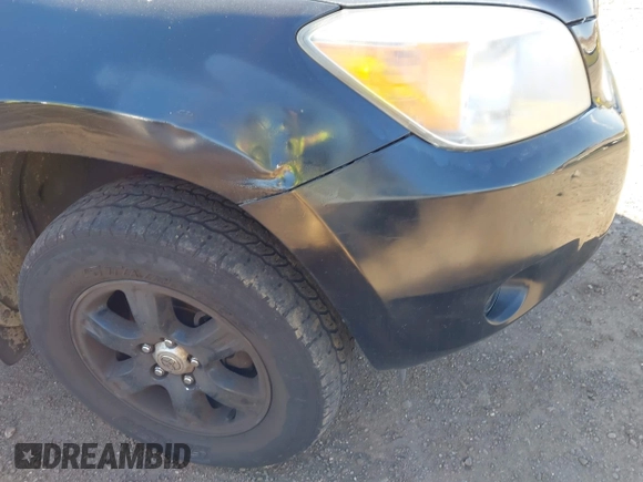 2007 Toyota RAV4 with VIN JTMBD33V676026194, listed as a IAAI auction lot 42001542 with 188,991 mi miles. Bid and sale history available at carsss.com. Image 12.