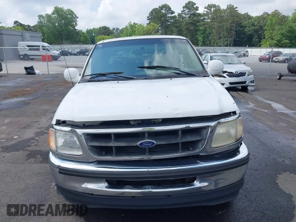 1998 Ford F-150 z VIN 1FTZX1762WNA68542, wystawiony jako IAAI lot #42300548 z przebiegiem 312 931 mil mil oraz . Historia ofert i sprzedaży dostępna na DreamBid. Obrazek 6.