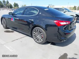 2019 Maserati Ghibli with VIN ZAM57XSA5K1328183, listed as a IAAI auction lot 41970101 with 61,260 mi miles. Bid and sale history available at carsss.com. Image 3.