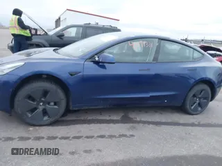 2021 Tesla Model 3 Long Range with VIN 5YJ3E1EB8MF848049, listed as a IAAI auction lot 40974331 with 61,462 mi miles. Bid and sale history available at carsss.com. Image 14.