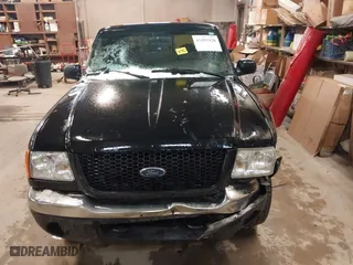 2003 Ford Ranger XL Fleet with VIN 1FTZR45EX3PA43491, listed as a IAAI auction lot 41492928 with 233,435 mi miles. Bid and sale history available at carsss.com. Image 12.