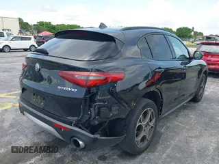 2018 Alfa Romeo Stelvio Sport z VIN ZASFAKPN8J7B58624, wystawiony jako IAAI lot #42380149 z przebiegiem 99 898 mil mil oraz . Historia ofert i sprzedaży dostępna na DreamBid. Obrazek 6.