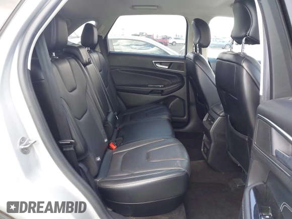 2015 Ford Edge Titanium z VIN 2FMTK4K95FBB47962, wystawiony jako IAAI lot #42234894 z przebiegiem Nie podano mil oraz . Historia ofert i sprzedaży dostępna na DreamBid. Obrazek 8.