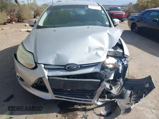2013 Ford Focus SE with VIN 1FADP3F21DL184625, listed as a IAAI auction lot 42575194 with 113,601 mi miles and . Bid and sale history available at DreamBid. Image 13.