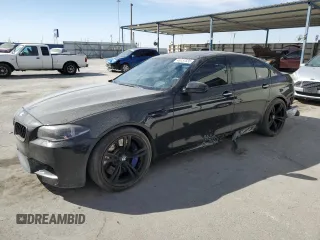 2015 BMW M5 with VIN WBSFV9C5XFD595148, listed as a Copart auction lot 46157335 with 77,582 mi miles and Salvage Title. Bid and sale history available at carsss.com. Image 1.