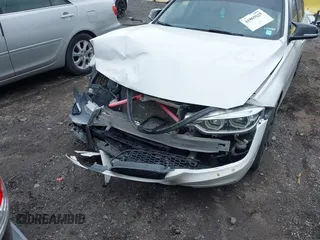 2018 BMW 3 Series 320i xDrive with VIN WBA8E5G52JNU46803, listed as a IAAI auction lot 41869625 with 67,057 mi miles. Bid and sale history available at carsss.com. Image 6.