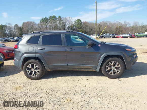 2014 Jeep Cherokee Trailhawk with VIN 1C4PJMBS6EW278987, listed as a IAAI auction lot 41789868 with 136,696 mi miles. Bid and sale history available at carsss.com. Image 14.
