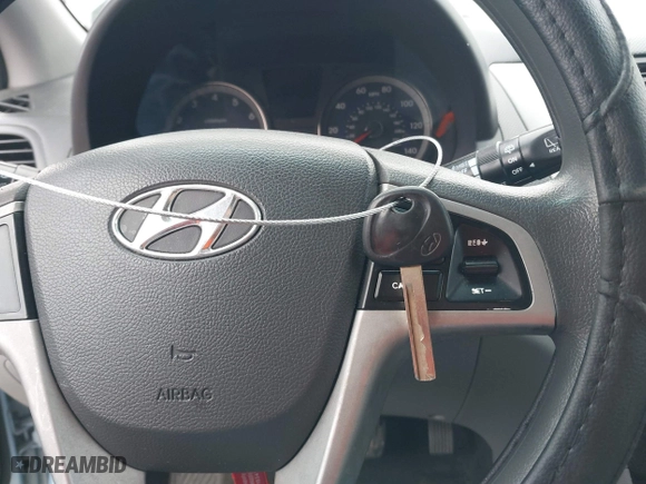 2014 Hyundai Accent GS with VIN KMHCT5AE1EU147015, listed as a IAAI auction lot 41659497 with 147,832 mi miles. Bid and sale history available at carsss.com. Image 11.