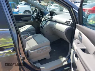 2016 Honda Odyssey EX-L z VIN 5FNRL5H65GB038372, wystawiony jako IAAI lot #41931292 z przebiegiem 51 484 mil mil oraz . Historia ofert i sprzedaży dostępna na DreamBid. Obrazek 5.
