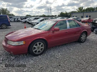 2002 Cadillac Seville Touring STS z VIN 1G6KY54922U288481, wystawiony jako Copart lot #68859394 z przebiegiem 63 612 mil mil oraz Szkody całkowita. Historia ofert i sprzedaży dostępna na DreamBid. Obrazek 1.
