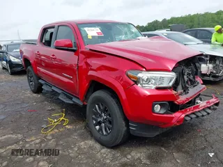 2021 Toyota Tacoma SR with VIN 3TYAX5GN1MT030226, listed as a IAAI auction lot 42266770 with Not provided miles and . Bid and sale history available at DreamBid. Image 1.