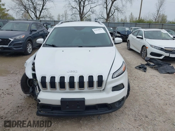 2014 Jeep Cherokee Latitude with VIN 1C4PJMCSXEW150735, listed as a IAAI auction lot 42020944 with 76,303 mi miles and . Bid and sale history available at carsss.com. Image 13.