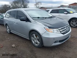 2011 Honda Odyssey Touring with VIN 5FNRL5H99BB003482, listed as a IAAI auction lot 41536126 with 183,134 mi miles. Bid and sale history available at carsss.com. Image 1.