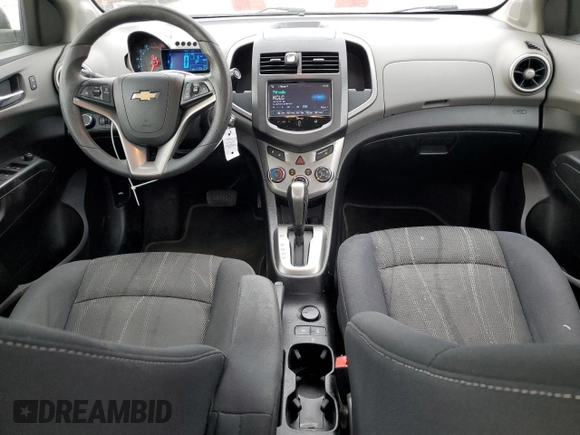 2015 Chevrolet Sonic LT with VIN 1G1JC5SH4F4212292, listed as a Copart auction lot 52339455 with 135,108 mi miles and Salvage Title. Bid and sale history available at DreamBid. Image 8.