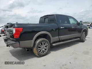 2016 Nissan Titan Platinum Reserve z VIN 1N6BA1F26GN506432, wystawiony jako Copart lot #55596075 z przebiegiem 153 972 mil mil oraz Czysty tytuł • Clean title. Historia ofert i sprzedaży dostępna na DreamBid. Obrazek 3.