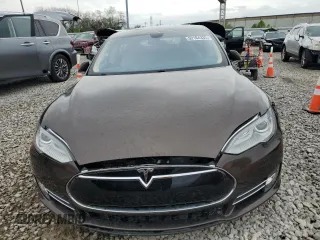 2014 Tesla Model S 60 with VIN 5YJSA1H19EFP51003, listed as a Copart auction lot 52164335 with 105,926 mi miles and Salvage Title. Bid and sale history available at DreamBid. Image 5.