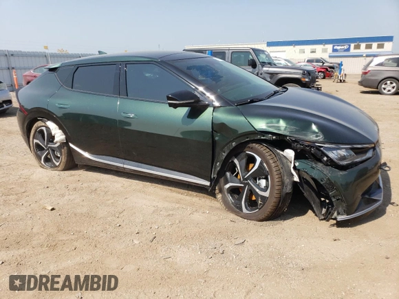 2023 Kia EV6 Wind with VIN KNDC3DLC9P5151238, listed as a Copart auction lot 65168714 with 9,521 mi miles and Salvage Title. Bid and sale history available at carsss.com. Image 4.