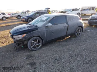 2019 Hyundai Veloster 2.0 with VIN KMHTG6AF6KU016662, listed as a IAAI auction lot 41354487 with 95,623 mi miles. Bid and sale history available at carsss.com. Image 2.