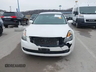 2009 Nissan Altima S z VIN 1N4AL21E99N499145, wystawiony jako IAAI lot #41689648 z przebiegiem 171 573 mil mil oraz . Historia ofert i sprzedaży dostępna na DreamBid. Obrazek 13.