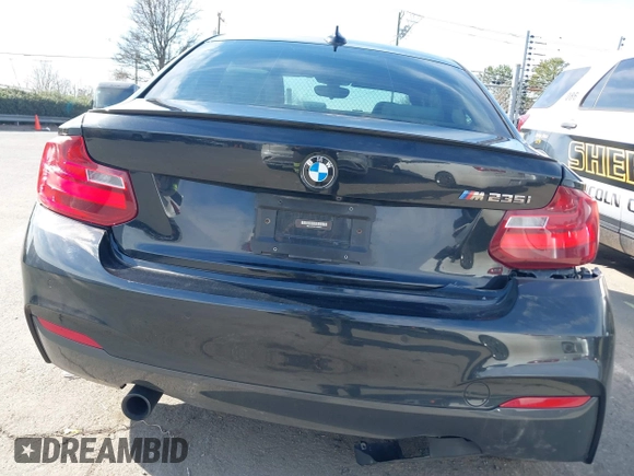 2015 BMW 2 Series M235i with VIN WBA1J7C55FV358964, listed as a IAAI auction lot 41674800 with 63,504 mi miles and . Bid and sale history available at carsss.com. Image 16.
