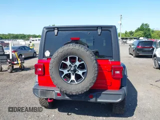 2021 Jeep Wrangler Unlimited Rubicon with VIN 1C4HJXFG2MW575541, listed as a IAAI auction lot 42247475 with 92,353 mi miles and . Bid and sale history available at DreamBid. Image 17.
