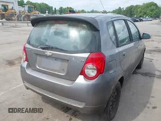 2011 Chevrolet Aveo 2LT z VIN KL1TG6DE7BB172574, wystawiony jako IAAI lot #42136995 z przebiegiem 167 649 mil mil oraz . Historia ofert i sprzedaży dostępna na DreamBid. Obrazek 4.