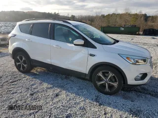 2017 Ford Escape SE with VIN 1FMCU0GD6HUB48986, listed as a Copart auction lot 43915415 with 122,465 mi miles and Salvage Title. Bid and sale history available at DreamBid. Image 4.