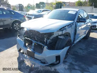 2023 BMW X4 M with VIN 5YM23EC0XP9P23425, listed as a IAAI auction lot 41147096 with 22,958 mi miles. Bid and sale history available at carsss.com. Image 6.