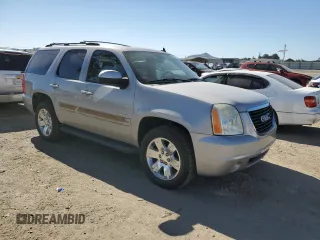 2007 GMC Yukon SLE z VIN 1GKFK13007J260249, wystawiony jako Copart lot #57646525 z przebiegiem 325 491 mil mil oraz Szkoda całkowita • Salvage title. Historia ofert i sprzedaży dostępna na DreamBid. Obrazek 4.